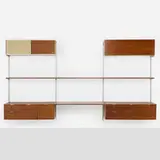 CSS (Comprehensive Storage System) by George Nelson & Associates, 1959, walnut, aluminum, lacquered Masonite, sold Aug 2025