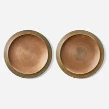 Chargers, pair by Angelo Mangiarotti, c. 1960, bronze, sold Aug 2025