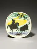 Picador et taureau by Pablo Picasso, 1953, Teller, Gravur mit oxidiertem Paraffin, akzentuiert mit Oxidbemalung, glasiert. 24 cm (9 ½ in.), sold Dec 2020