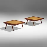 Ottomans, pair by George Nakashima, 1962, American black walnut, upholstery, sold Jan 2023
