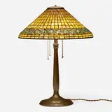 Greek Key table lamp by Tiffany Studios, c. 1910, leaded glass, patinated bronze, sold Jan 2023
