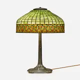 Greek Key table lamp by Tiffany Studios, c. 1910, leaded glass, patinated bronze, sold Jan 2023