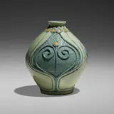 Della Robbia vase with stylized blossoms by Frederick Hurten Rhead for Roseville Pottery, 1906-07, glazed and carved earthenware, sold Jan 2023