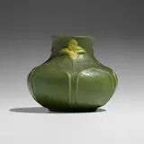 Vase with blossoms and leaves by Marie Seaman for Grueby Faience Company, 1898-1910, glazed earthenware, sold Jan 2023