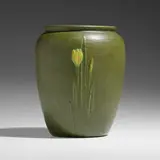 Vase with crocuses by Eva Russell for Grueby Faience Company, c. 1905, glazed earthenware, sold Jan 2023