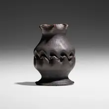 Vase by George E. Ohr, c. 1900, glazed earthenware, sold Jan 2023
