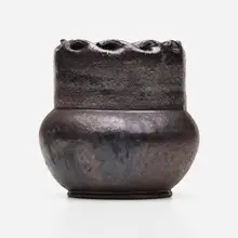 Vase by George E. Ohr, 1897-1900, glazed earthenware, sold Jan 2023