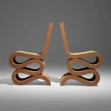 Wiggle chairs, pair by Frank Gehry, 1972, laminated cardboard, Masonite, sold Aug 2025
