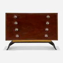 Cabinet from the 3920 series by Gilbert Rohde, 1939, East India laurel, redwood burl, lacquered wood, brass, acrylic, leatherette, sold Aug 2025