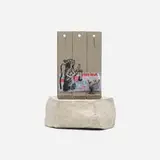Banksy, Walled Off Hotel Souvenir (Slingshot Rat), 2019, hand-painted resin sculpture with West Bank Separation Wall base