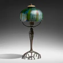 Pulled-Feather table lamp by Tiffany Studios, c. 1910, hand-blown Favrile glass, patinated bronze, sold Jan 2023