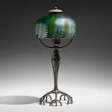 Pulled-Feather table lamp by Tiffany Studios, c. 1910, hand-blown Favrile glass, patinated bronze, sold Jan 2023