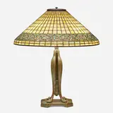 Greek Key table lamp by Tiffany Studios, c. 1910, leaded glass, patinated bronze, sold Jan 2023