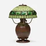 Turtleback table lamp by Tiffany Studios, c. 1910, leaded glass, Favrile glass, patinated bronze, sold Jan 2023