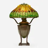Jeweled Feather table lamp by Tiffany Studios, c. 1910, leaded glass, patinated bronze, sold Jan 2023
