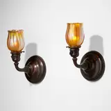 Sconces, pair by Tiffany Studios, c. 1910, patinated bronze, hand-blown Favrile glass, sold Jan 2023