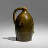 Puzzle jug by George E. Ohr, 1895-96, glazed earthenware, sold Jan 2023
