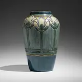 Early and Large vase with magnolias by Leona Nicholson for Newcomb College Pottery, 1905, glazed earthenware, sold Jan 2023