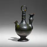 Tall pitcher by George E. Ohr, 1897-1900, glazed earthenware, sold Jan 2023