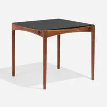Game table by Aksel Bender Madsen and Ejner Larsen, 1957, teak, leather, sold Jul 2025