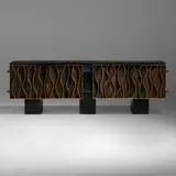 Wavy Front cabinet by Paul Evans, 1973, welded, gilt, polychromed and patinated steel, sold Sep 2022
