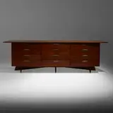 Origins cabinet, model 212 by George Nakashima, c. 1958, rosewood, walnut, brass, sold Sep 2022