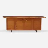 Rare cabinet by George Nakashima, 1961, American black walnut, oak burl, sold Sep 2022