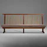 Rare Conoid settee by George Nakashima, 1968, American black walnut, hickory, upholstery, sold Sep 2022