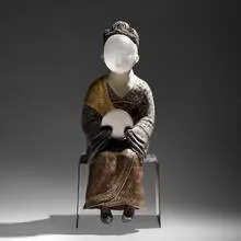 Vivian Wang, Pastime (from the Invisible People series), 2011, hand-painted stoneware, cast glass, steel base