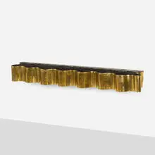 Wall-hanging shelf by Silas Seandel, 1973, bronzed steel, sold Sep 2022