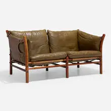 Arne Norell, Illona settee, stained beech, leather, saddle-stitched leather, base metal