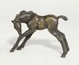 Sich leckendes Fohlen by Renée Sintenis, 1928, Bronze mit brauner Patina. Höhe: 10 cm (3 ⅞ in.), sold Nov 2010
