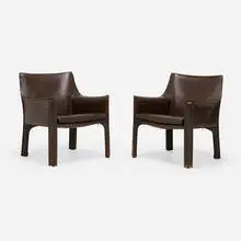 Cab chairs model 413, pair by Mario Bellini, leather upholstery over steel, sold Jun 2025