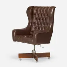 Kennedy swivel office chair by Sergio Rodrigues, 1963, leather upholstery, jacaranda, casters, sold Jun 2025