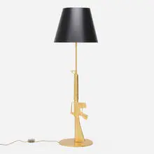 Philippe Starck, Lounge Gun floor lamp, 2005, gilt aluminum with polymer coating, gilt steel