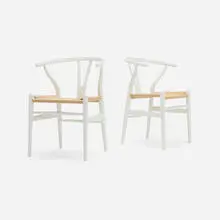 Wishbone chairs model CH24, pair by Hans J. Wegner, lacquered wood, paper cord, sold Jun 2025