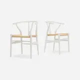 Hans J. Wegner, Wishbone chairs model CH24, pair, lacquered wood, paper cord