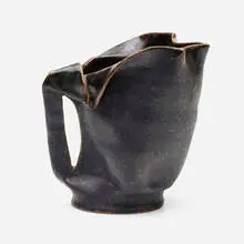 Pitcher by George E. Ohr, 1898-1910, glazed earthenware, sold Sep 2022