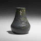 Vase with conventionalized grapes by Frederick Hurten Rhead for Arequipa Pottery, 1912, glazed squeezebag-decorated earthenware, sold Sep 2022