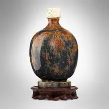 Maurice Gensoli, Bottle with stand, c. 1930, carved and glazed stoneware