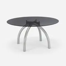 Spider dining table by Ettore Sottsass, 1986, enameled and powder-coated steel, tempered and smoked glass, sold Jun 2025