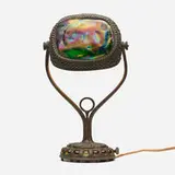 Turtleback desk lamp by Tiffany Studios, c. 1910, patinated bronze, Favrile glass, sold Sep 2022
