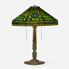 Harvard table lamp by Tiffany Studios, c. 1910, leaded glass, patinated bronze, sold Sep 2022