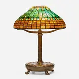 Jeweled Feather table lamp by Tiffany Studios, c. 1910, leaded glass, patinated bronze, sold Sep 2022