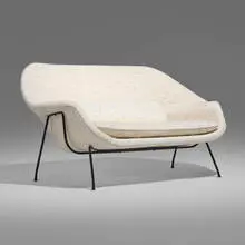 Womb settee by Eero Saarinen, 1946, upholstery, lacquered steel, sold Jun 2025