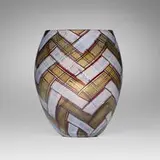 A Spina vase by Ercole Barovier, glass tesserae edged in amethyst, sold Jun 2025