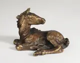 Liegendes Fohlen by Renée Sintenis, 1932, Bronze mit goldbrauner Patina. Höhe: 7 cm (2 ¾ in.), sold Nov 2008