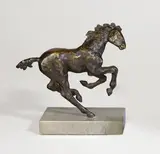 Galoppierendes Fohlen by Renée Sintenis, 1928, Bronze mit schwarzbrauner Patina, auf Steinsockel montiert. Höhe (ohne Sockel): 12 cm (4 ¾ in.), sold Jun 2010