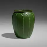 Vase with layered leaves by Grueby Faience Company, 1898-1910, glazed earthenware, sold Sep 2022
