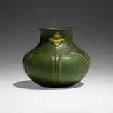 Vase with daffodils and leaves by Grueby Faience Company, 1898-1910, glazed earthenware, sold Sep 2022